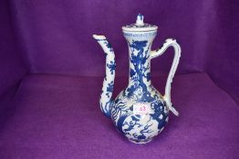 A modern Chinese rice wine or similar ewer having dragon decoration with seal mark to base