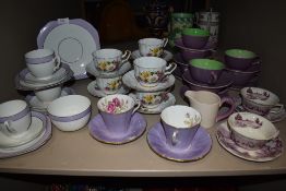 A selection of tea cups and saucers including Adderley and Royal London