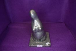 A modernist style metal sculpture study of a nude figure