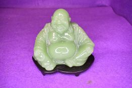 A figure study of a seated Chinese Buddha no makers marks shown