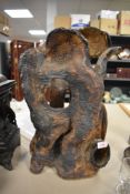 A mid century studio pottery sculpture of naturalistic form 43cm tall