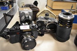 A selection of cameras and photographic items including C8 Paillard Bolex, RF Hunter Gilbert,