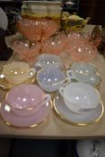 A selection of art deco glass wares including dessert bowls and Arcopal harlequin tea cup and saucer