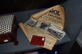 A selection of black and white photographic postcards and a vintage garage forecourt poster for