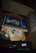 A selection of collectable world stamps and cigarette cards including DIY interest