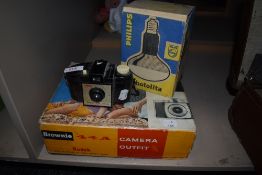A selection of camera equipment including Philips photolita bulb, Brownie flash holder 3 Kodak
