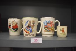 Four childrens ceramic cups one being decorated with Magic Roundabout characters
