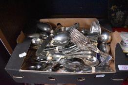 A large selection of tableware cutlery and flatware including knives forks spoons etc