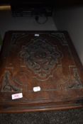 A late Victorian bible box having carved mahogany case decoration