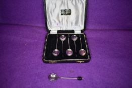 A cased set of HM silver dessert or tea spoons art deco design having fine body with black finger