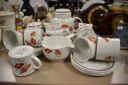A part tea service by Royal Doulton Lambethware in the fieldflower design
