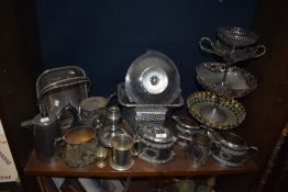 A selection of silver plated table wares including footed tazza, tea set and candle stem