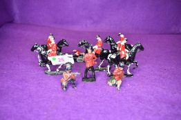 Six Lead flat figures, Black Horse with Rider wearing red jacket, all on base stand along with three