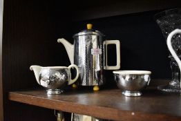 A mid century insulated coffee pot trio.