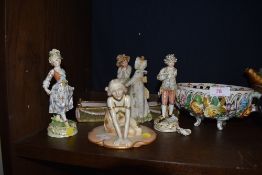 A selection of ceramic and porcelain figures including flower bowl