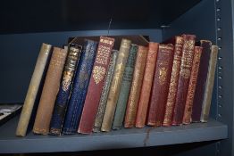A selection of library books and volumes including Charles Dickens and Jane Austin