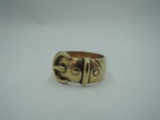 A gent's 9ct gold buckle ring of large form, size W & approx 16.4g