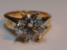 A diamond solitaire dress ring, approx 1.87ct brilliant cut, in a 6 claw tapered mount to engraved