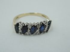 A sapphire and diamond dress ring having five marquise cut sapphires interspersed by diamond chips