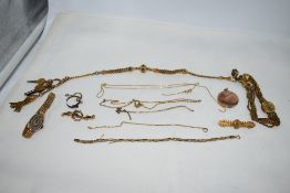 A selection of yellow metal and gold plated jewellery including vantage 9ct gold watch on rolled