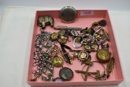 A selection of vintage costume jewellery including necklaces, brooches, rolled gold sovereign