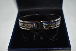 A Frey Wille hinged bangle having enamelled decoration, with box