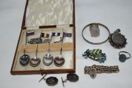 A selection of silver and white metal jewellery including Lisbon souvenir cufflinks, salve bangle,