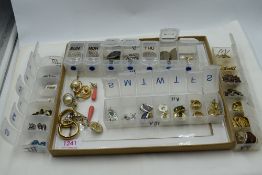 A large selection of earrings for pierced and non pierced ears of various forms, including Oscar