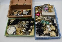 A selection of vintage costume jewellery including clip earrings, morning jewellery beaded watch