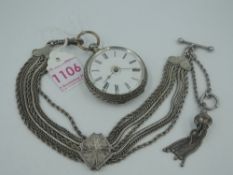 A lady's Swiss white metal key wound pocket watch having Roman numeral dial to decorative face in