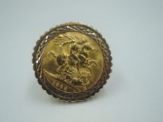 A 1968 gold sovereign in a 9ct gold removable ring mount, size U & approx 16.2g, (loop split)