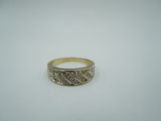 A 9ct gold band ring having a diamond chip panel to front, size Q & approx 3.7g
