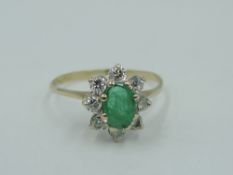 A chrysoberyl and cubic zirconia cluster ring on a 9ct gold loop, size M & approx 1.5g