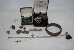 A selection of HM silver and white metal jewellery including hinged bangle, Luckenbooth brooch, Blue