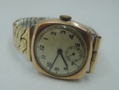 A gent's vintage 9ct rose gold wrist watch having Arabic numeral dial with subsidiary seconds in a