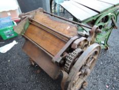 A vintage cast iron mangle