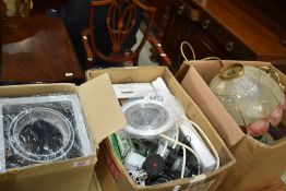 Four boxes of assorted light fittings etc
