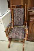 A late Victorian spindle frame American Boston 1890 rocking chair