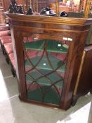 A 19th Century mahogany corner wall display cabinet, has been later lined and adapted inside