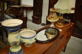 A selection of items including oval wall mirror, jardiniere stand, and vintage table lamps