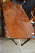 An interesting 19th Century and later pedestal table having turned column base on triple splay