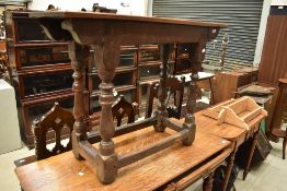 A period oak side table having turned legs, top either replaced or restored, width approx. 102cm