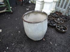 A vintage dolly or wash tub