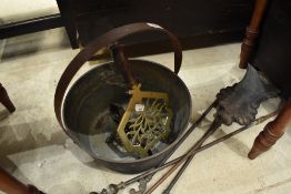 A brass jam pan, trivet and selection of fire tools