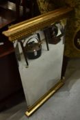 A vintage gilt frame wall mirror having open sides