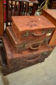 A nice selection of vintage suitcases , good authentic wear, including leather