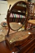 An early 20th Century mahogany and inlaid toilet mirror having shaped triple drawer base, width