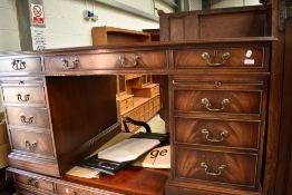 A reproduction Regency style pedestal desk having leather skiver top , large proportions approx