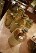 A selection of salt glazed stoneware bottles and jars