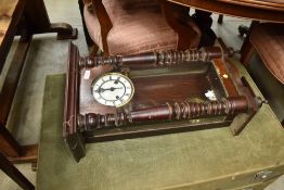 A late 19th or early 20th Century mahogany cased wall clock
